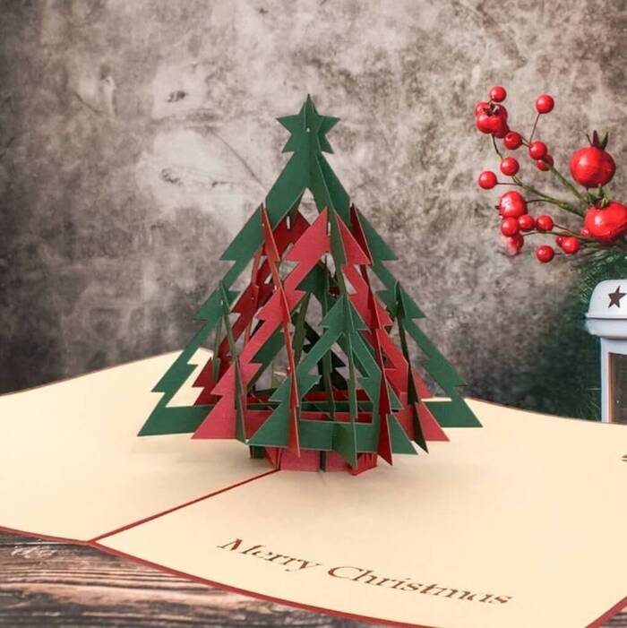 Add a touch of whimsy to your Christmas card by creating a DIY pop-up