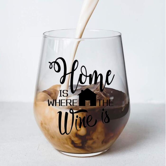 Raise a toast to their new abode with personalized engraved wine glasses or mugs